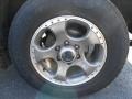 2002 Nissan Xterra SE V6 SC 4x4 Wheel and Tire Photo