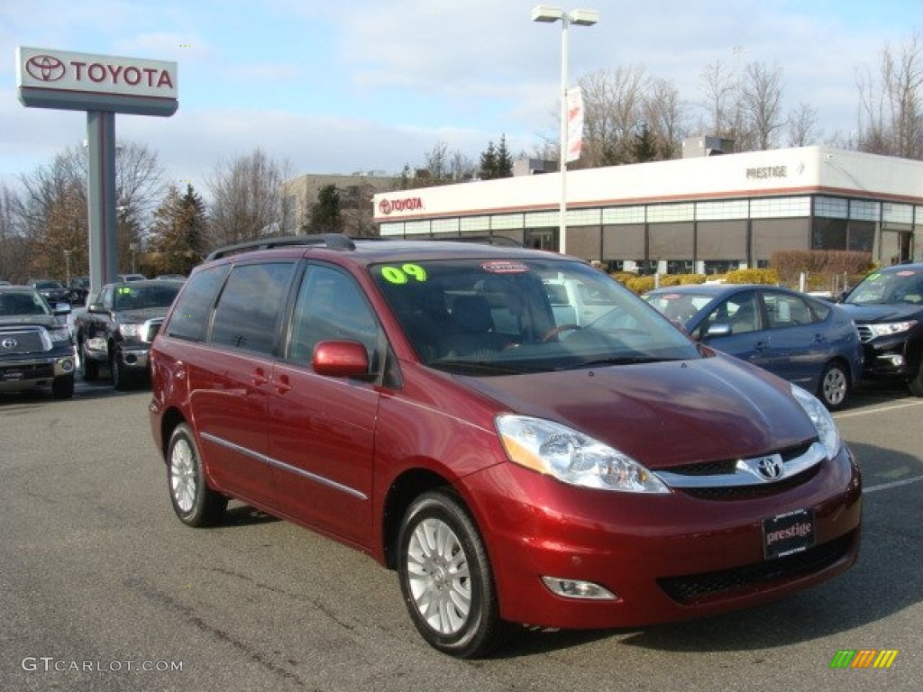 2009 Sienna Limited AWD - Salsa Red Pearl / Stone photo #1