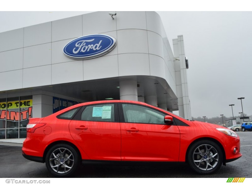 Race Red 2013 Ford Focus SE Sedan Exterior Photo #77179989