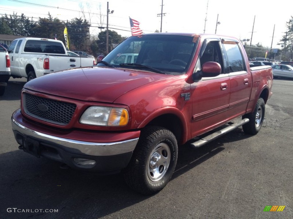 2002 F150 XLT SuperCab 4x4 - Toreador Red Metallic / Dark Graphite photo #1