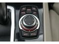 Oyster/Black Controls Photo for 2011 BMW 7 Series #77258152