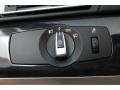 Oyster/Black Controls Photo for 2011 BMW 7 Series #77258388