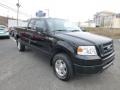 2006 Black Ford F150 STX SuperCab 4x4  photo #1