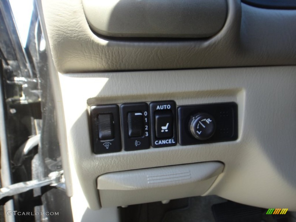 2002 QX4 4x4 - Black Obsidian / Stone Beige photo #16