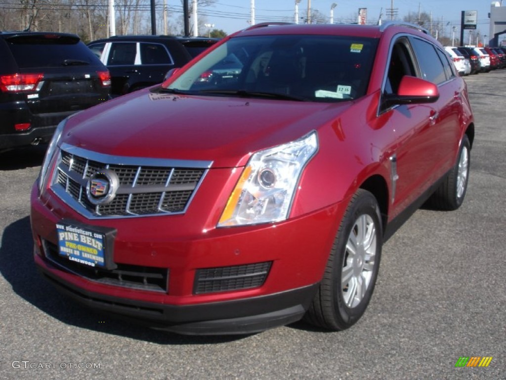 Crystal Red Tintcoat Cadillac SRX