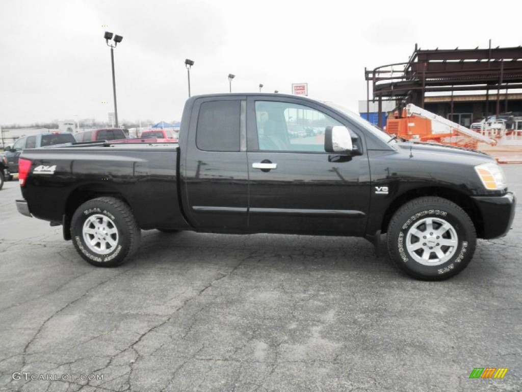 2004 Titan SE King Cab 4x4 - Galaxy Black / Graphite/Titanium photo #1