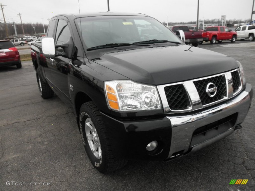 Galaxy Black 2004 Nissan Titan SE King Cab 4x4 Exterior Photo #77287594