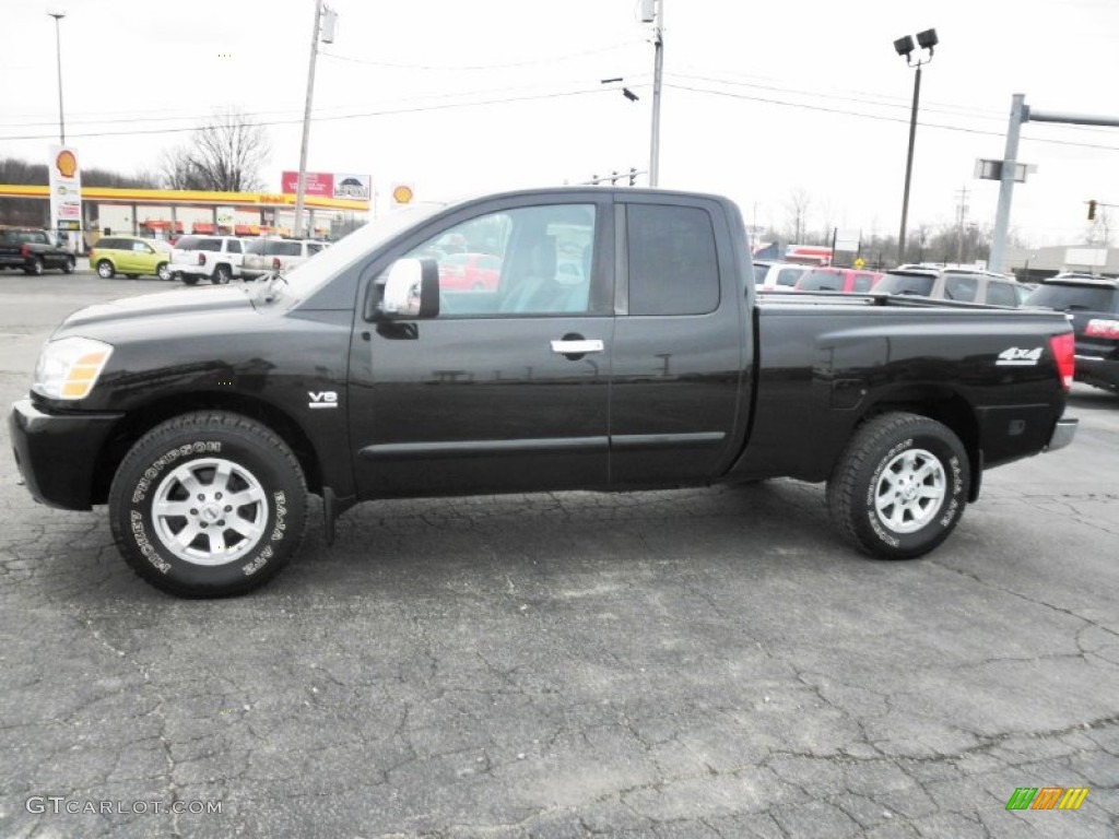 Galaxy Black 2004 Nissan Titan SE King Cab 4x4 Exterior Photo #77287644