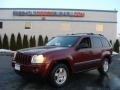 2006 Red Rock Crystal Pearl Jeep Grand Cherokee Laredo 4x4  photo #1