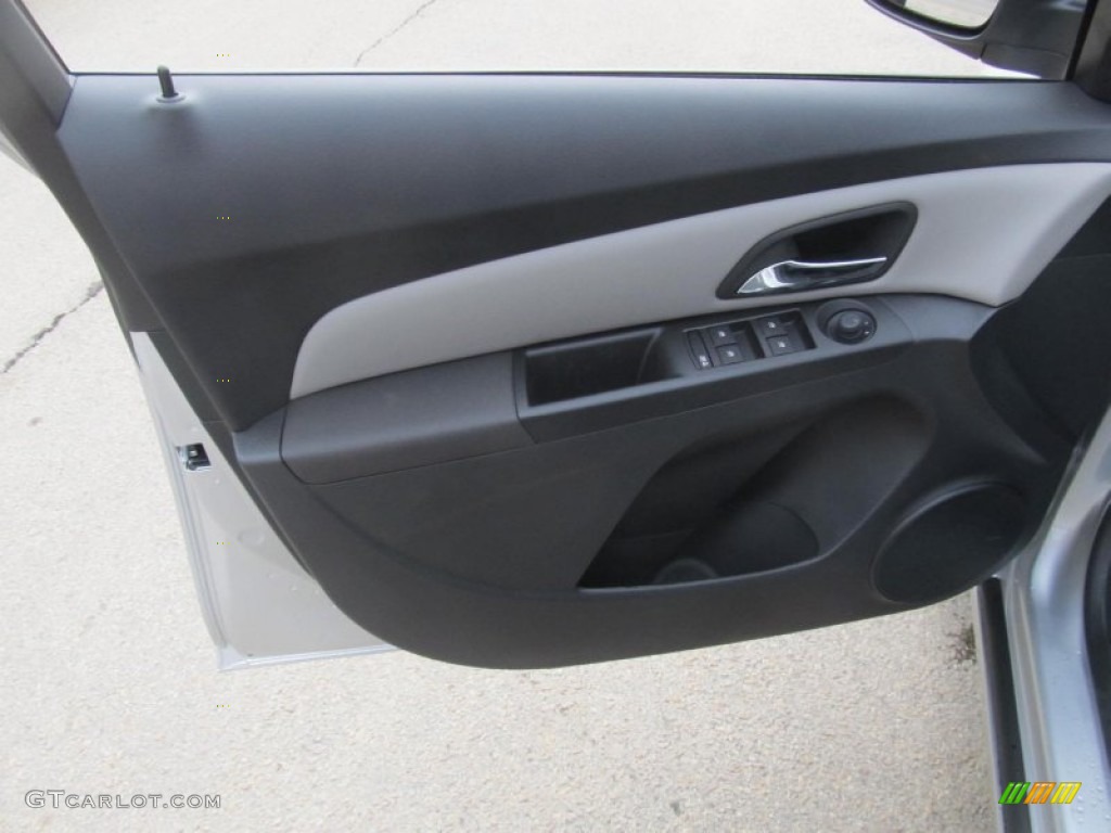 2013 Chevrolet Cruze LS Jet Black/Medium Titanium Door Panel Photo #77299278