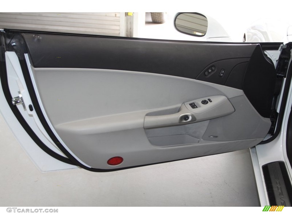 2009 Chevrolet Corvette Coupe Ebony/Titanium Gray Door Panel Photo #77308434