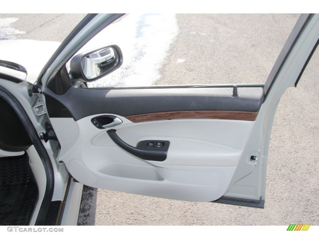 2006 Saab 9-3 2.0T Sport Sedan Parchment Door Panel Photo #77317194