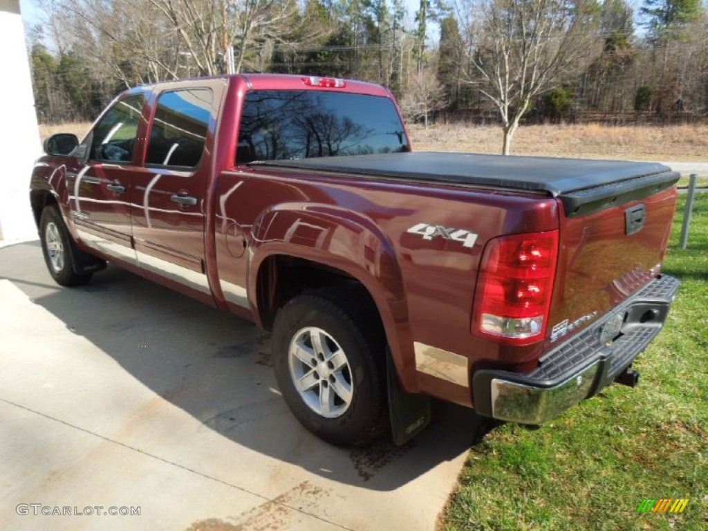 Sonoma Red Metallic 2009 GMC Sierra 1500 SLE Crew Cab 4x4 Exterior Photo #77334679