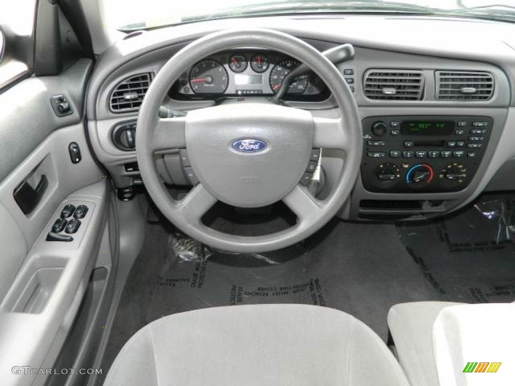 2004 Ford Taurus LX Sedan Medium Graphite Dashboard Photo #77363282