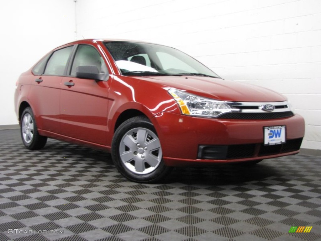 2010 Focus S Sedan - Sangria Red Metallic / Medium Stone photo #1