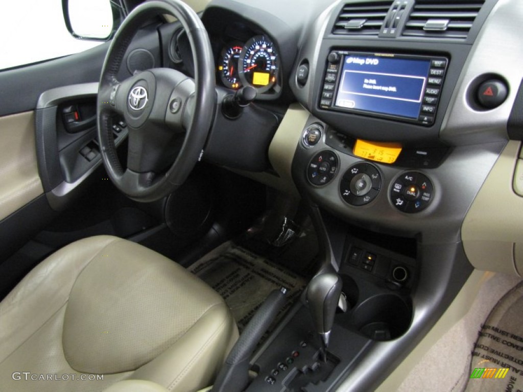 2010 Toyota RAV4 Limited V6 4WD Sand Beige Dashboard Photo #77403810
