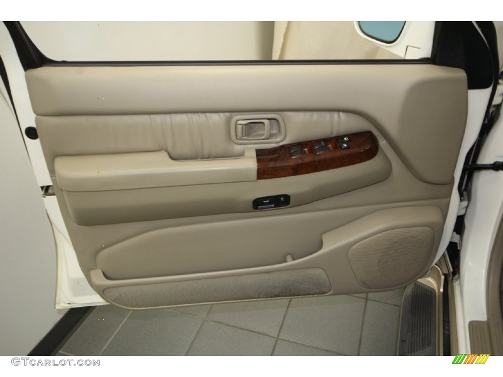 2000 Infiniti QX4 Standard QX4 Model Stone Beige Door Panel Photo #77406072