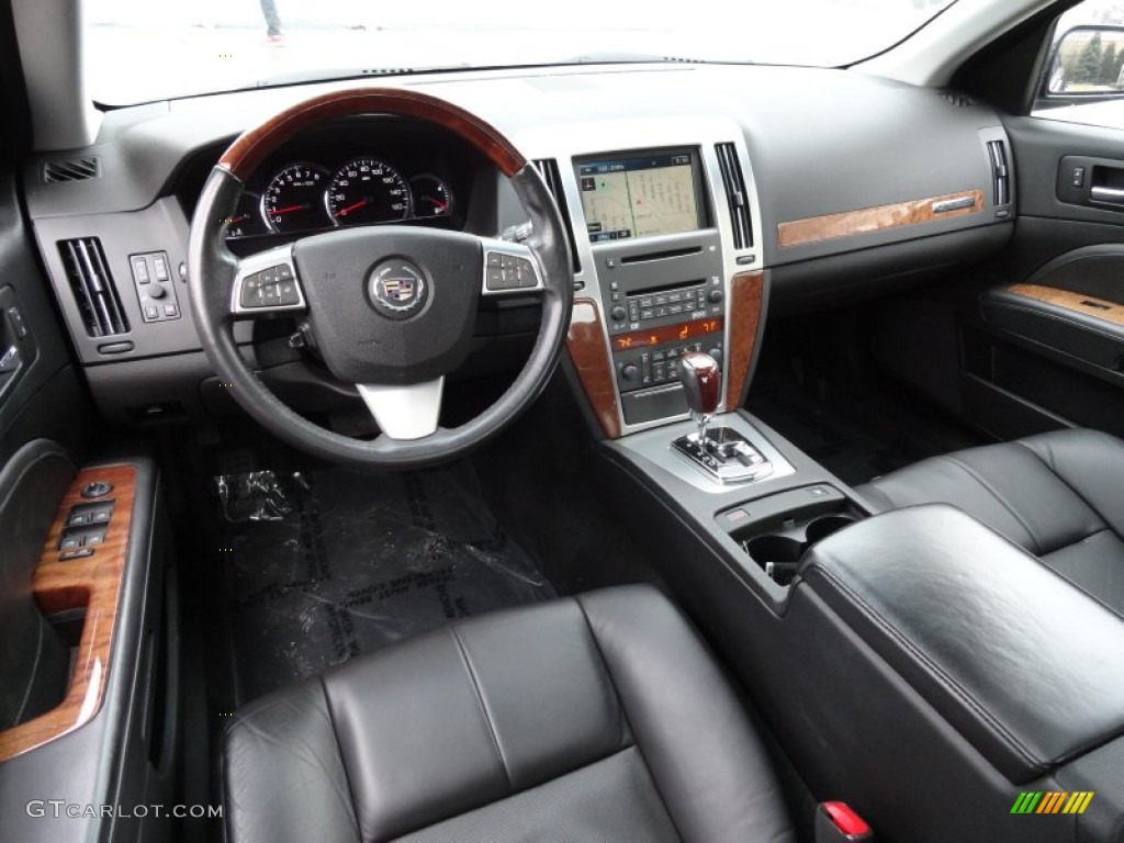 Ebony Interior 2010 Cadillac STS V6 Luxury Photo #77408936