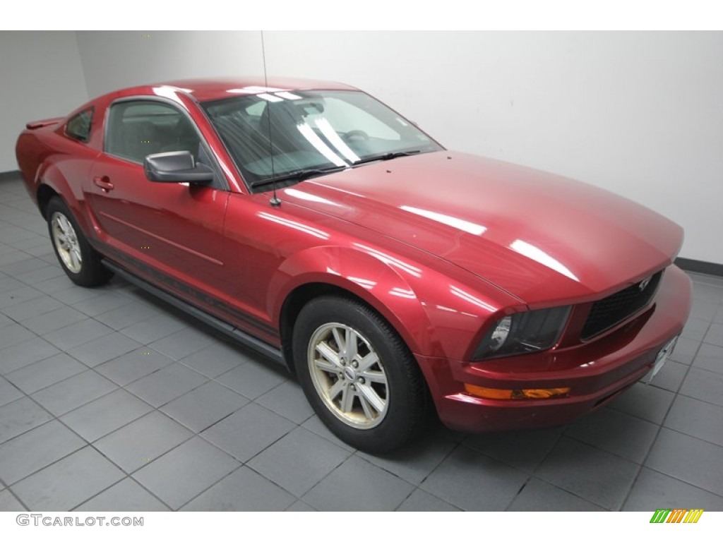 Redfire Metallic 2007 Ford Mustang V6 Deluxe Coupe Exterior Photo #77421135