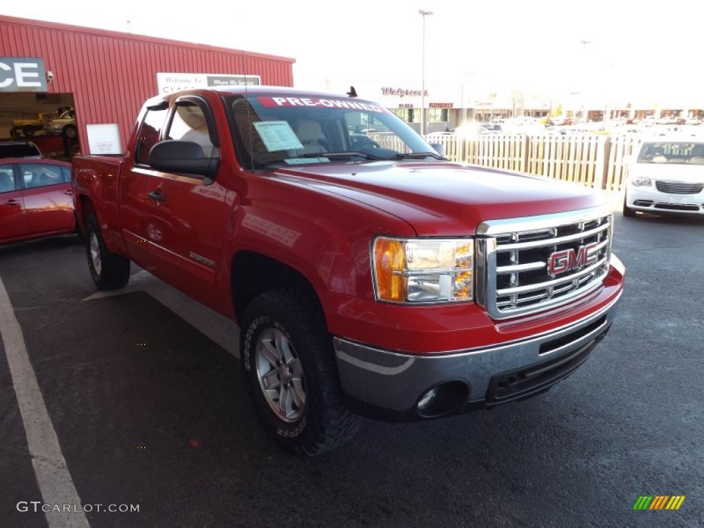 2010 Sierra 1500 SLE Extended Cab 4x4 - Fire Red / Ebony/Light Cashmere photo #1