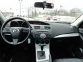 Black 2010 Mazda MAZDA3 i Touring 4 Door Dashboard