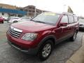 2009 Spicy Red Kia Borrego LX V6 4x4  photo #4