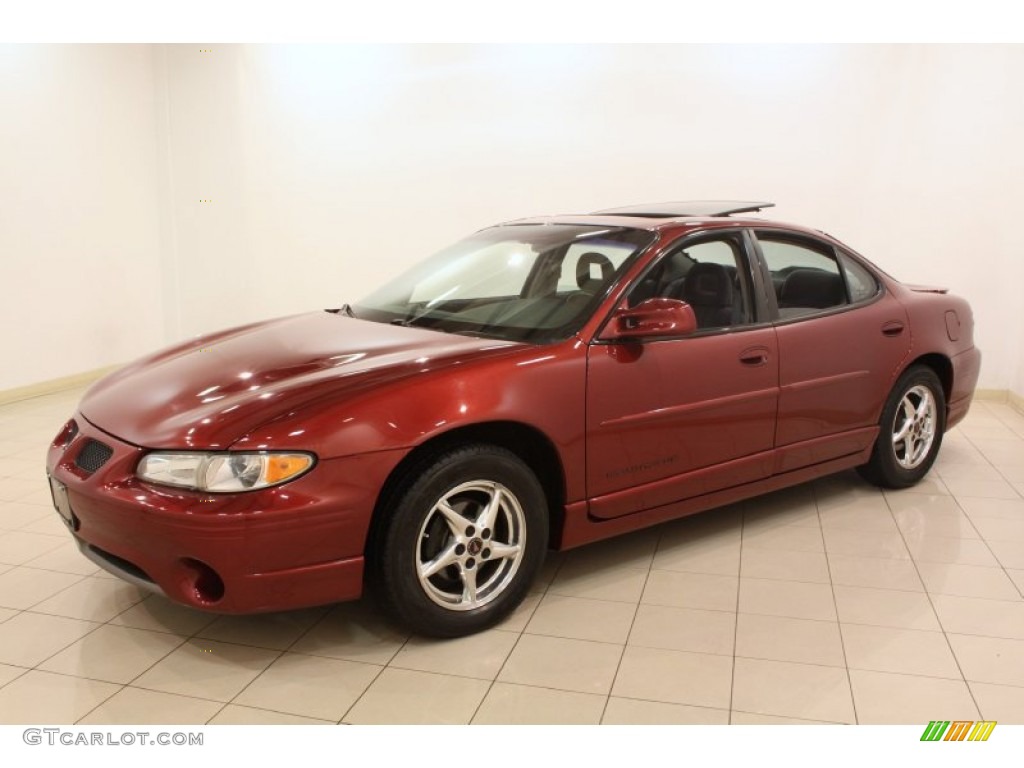Redfire Metallic 2002 Pontiac Grand Prix GT Sedan Exterior Photo #77495492