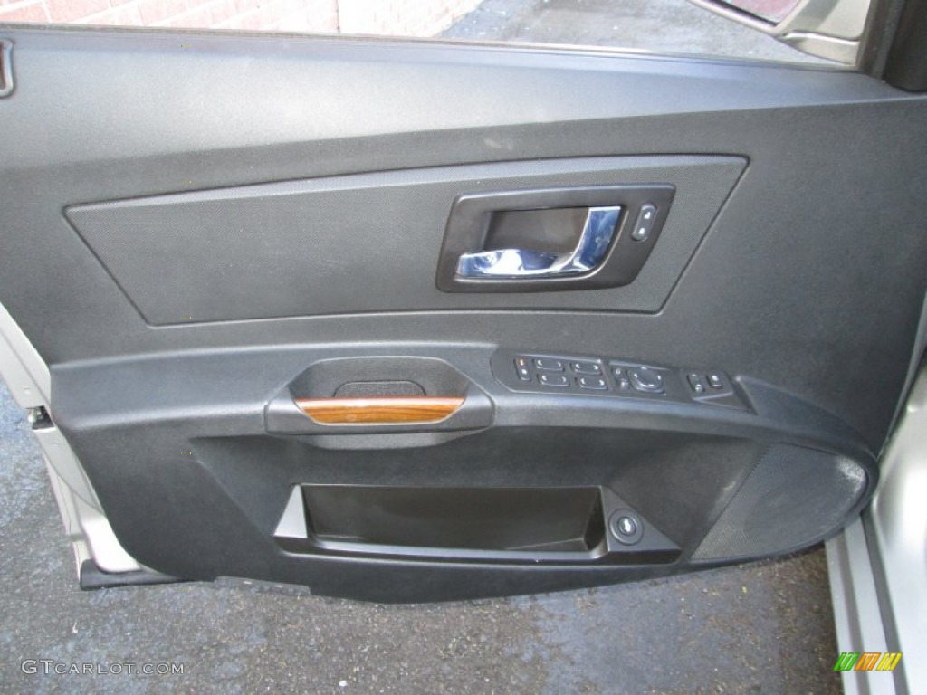 2005 Cadillac CTS Sedan Ebony Door Panel Photo #77503775