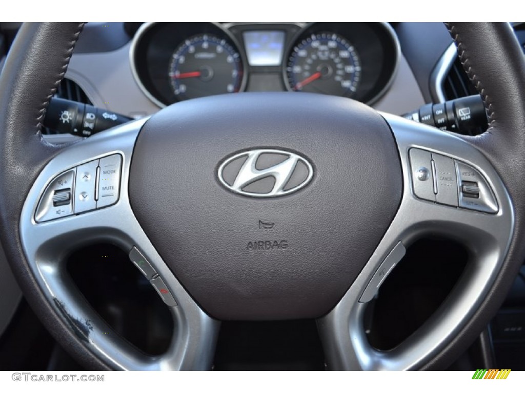 2010 Hyundai Tucson GLS Taupe Steering Wheel Photo #77530235