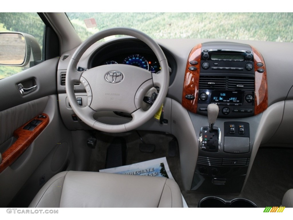 2009 Toyota Sienna XLE Taupe Dashboard Photo #77530580