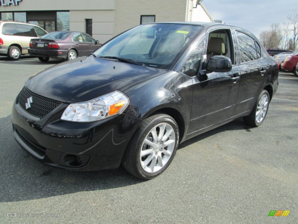 2011 SX4 Sedan LE - Black Pearl Metallic / Beige photo #2