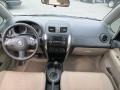 2011 Suzuki SX4 Beige Interior Dashboard Photo
