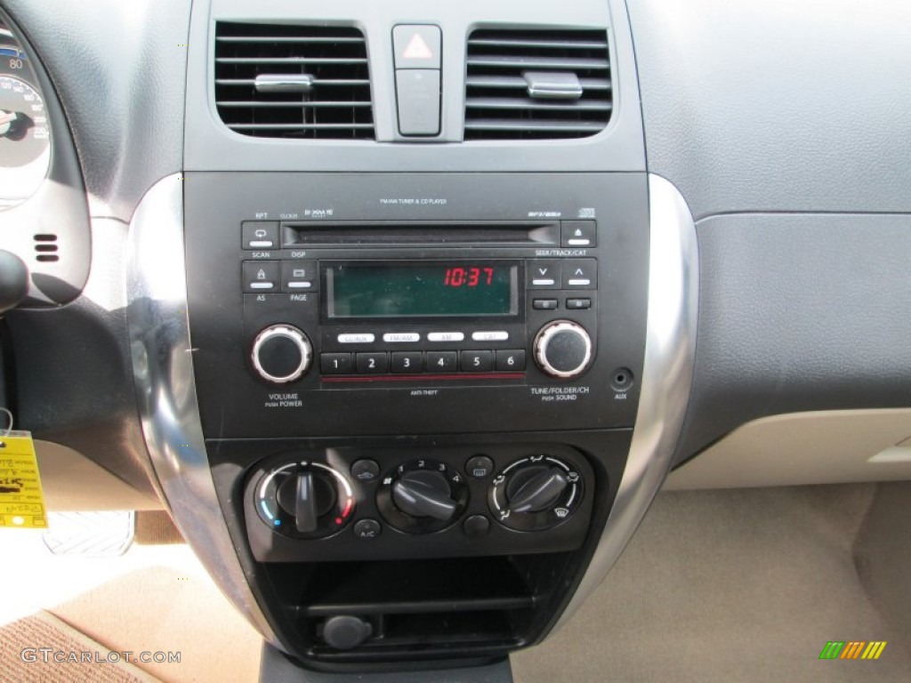 2011 Suzuki SX4 Sedan LE Controls Photo #77532710