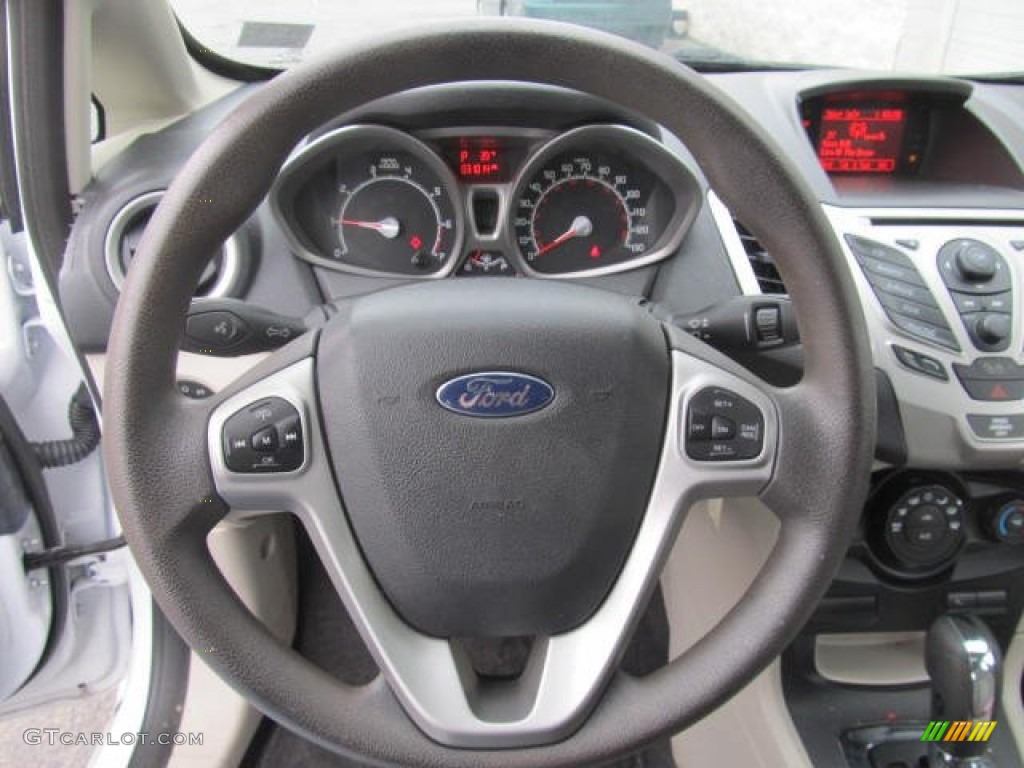 2011 Ford Fiesta SE Hatchback Light Stone/Charcoal Black Cloth Steering Wheel Photo #77605165