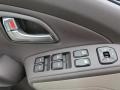 Taupe Controls Photo for 2012 Hyundai Tucson #77609376