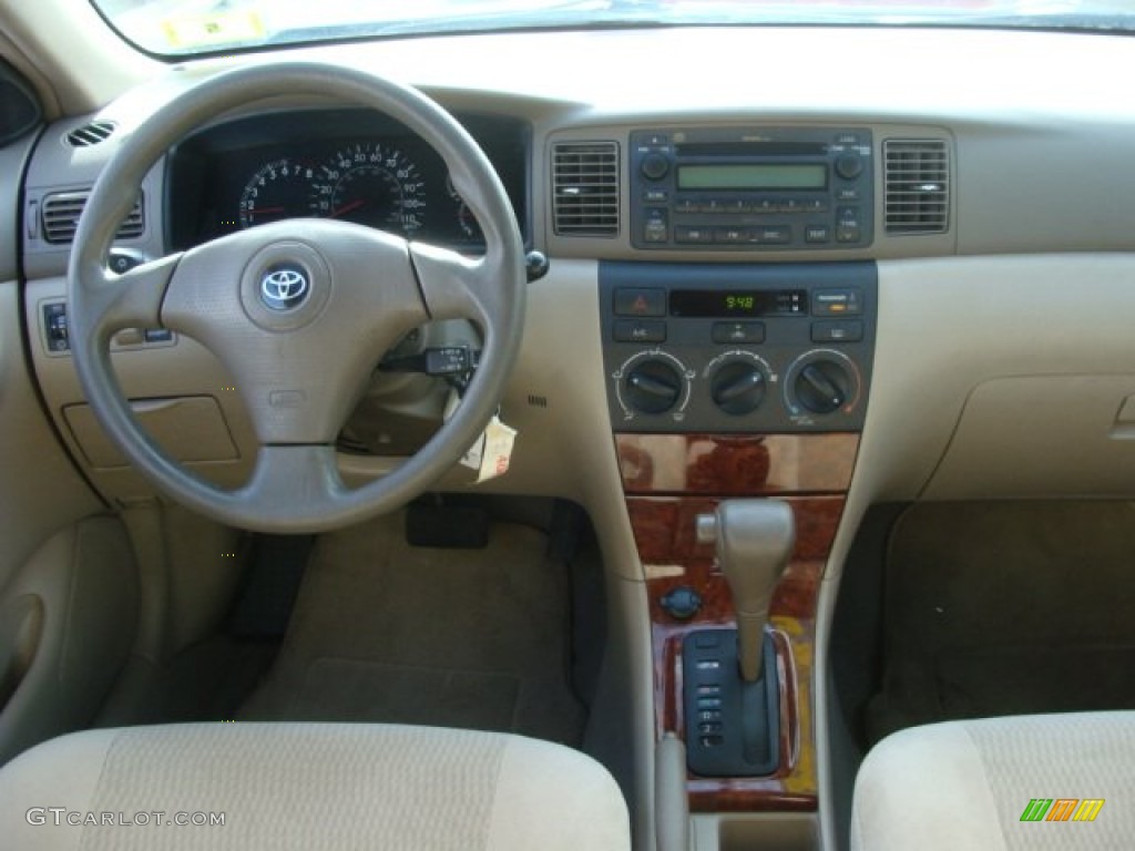 2005 Toyota Corolla LE Pebble Beige Dashboard Photo #77609442