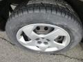 2005 Pontiac Vibe Standard Vibe Model Wheel and Tire Photo