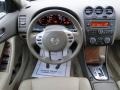 2009 Nissan Altima Blond Interior Steering Wheel Photo