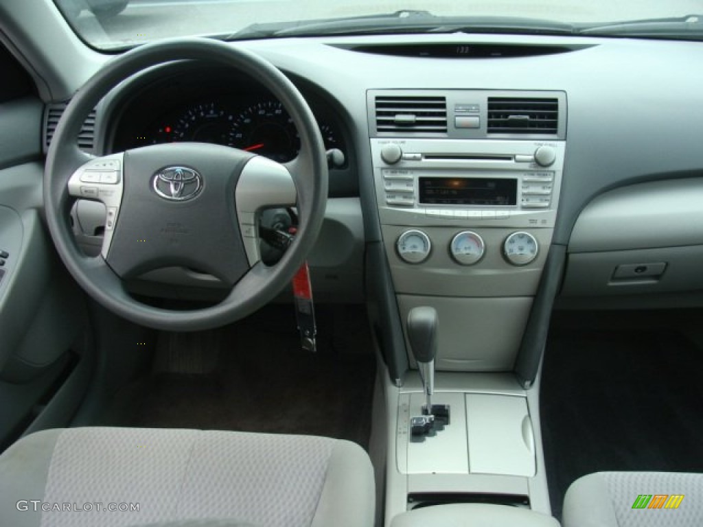 2010 Toyota Camry LE Ash Gray Dashboard Photo #77639349