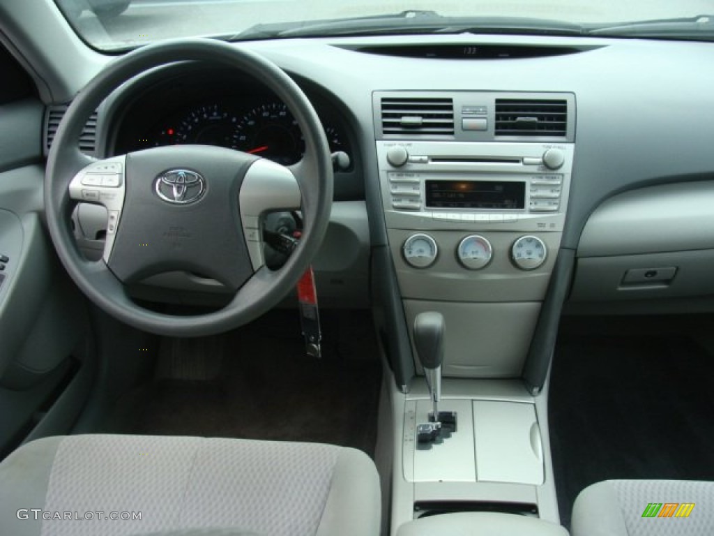 2010 Toyota Camry LE Ash Gray Dashboard Photo #77639349