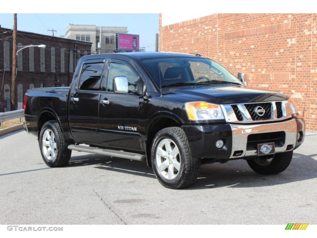 Navy Blue Metallic 2010 Nissan Titan LE Crew Cab 4x4 Exterior Photo #77654939
