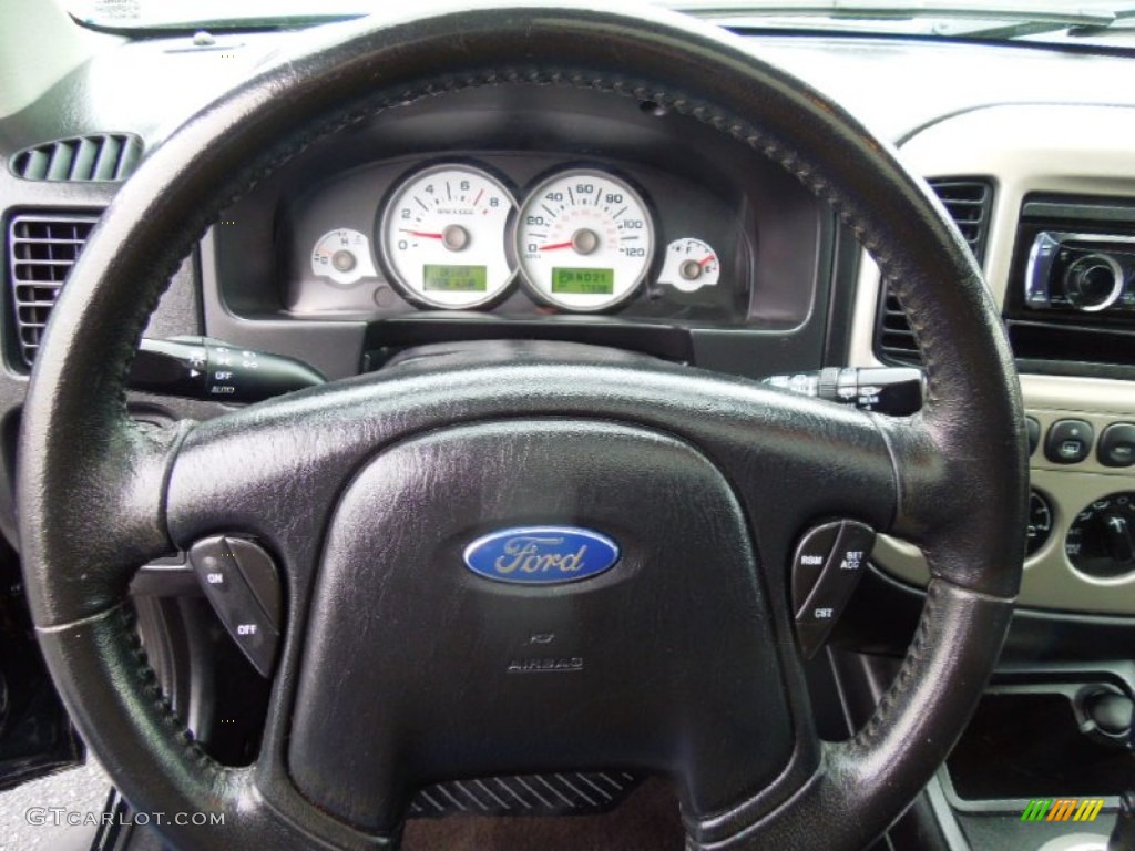 2006 Ford Escape Limited Ebony Black Steering Wheel Photo #77696111