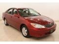 2003 Salsa Red Pearl Toyota Camry LE V6  photo #1