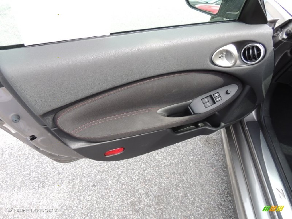 2010 Nissan 370Z NISMO Coupe NISMO Black/Red Cloth Door Panel Photo #77745006