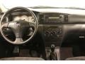 Dark Charcoal Dashboard Photo for 2006 Toyota Corolla #77752641