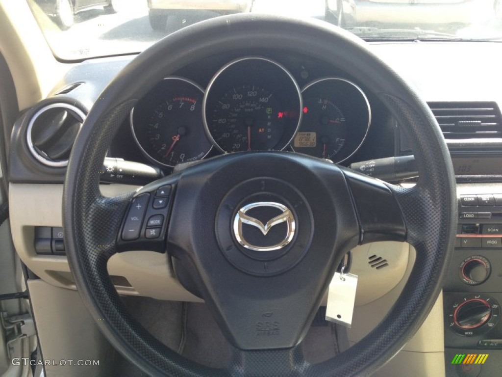 2005 Mazda MAZDA3 i Sedan Beige Steering Wheel Photo #77757034