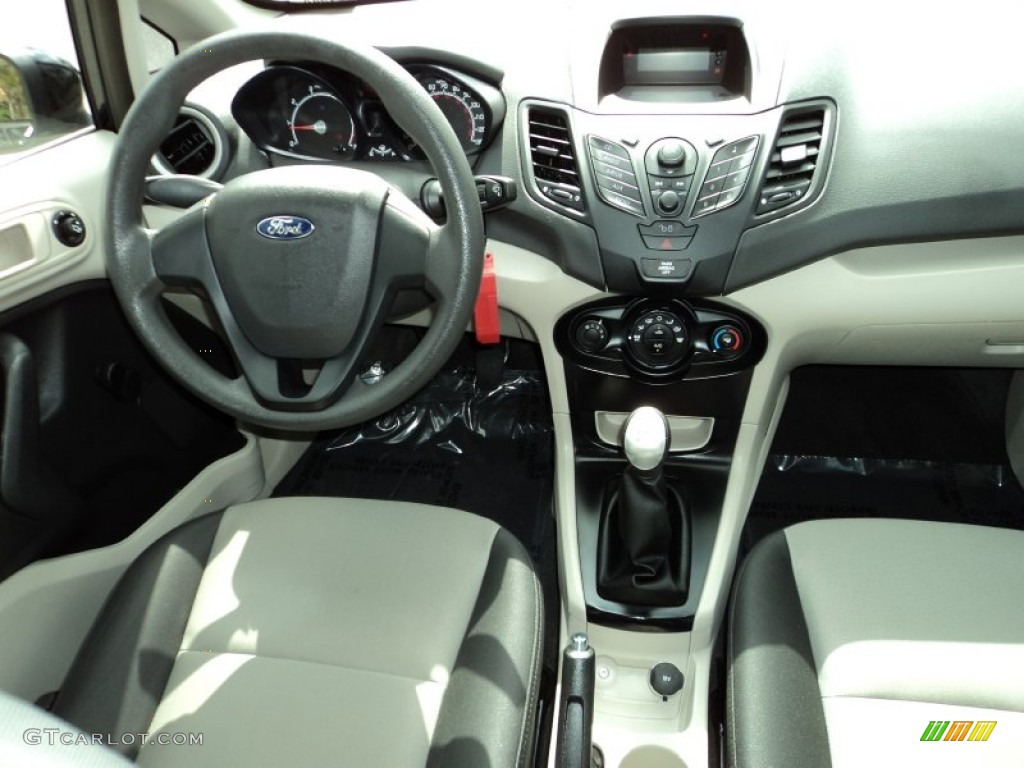 2012 Ford Fiesta S Sedan Light Stone/Charcoal Black Dashboard Photo #77757504