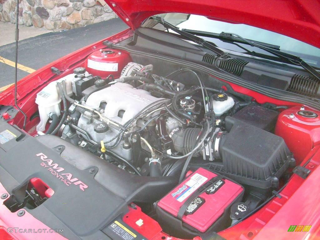 2004 Grand Am GT Sedan - Victory Red / Dark Pewter photo #28