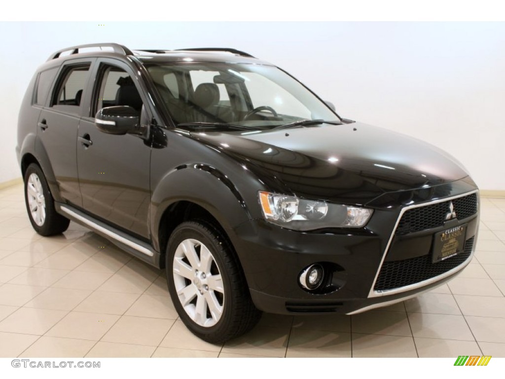 2010 Outlander SE - Labrador Black Pearl / Black photo #1