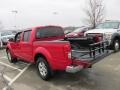 2009 Red Alert Nissan Frontier SE Crew Cab 4x4  photo #11